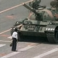 famous photo man in front of tank